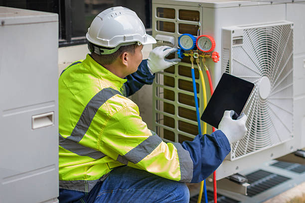 Professional Hvac technician working in Zavalla, TX